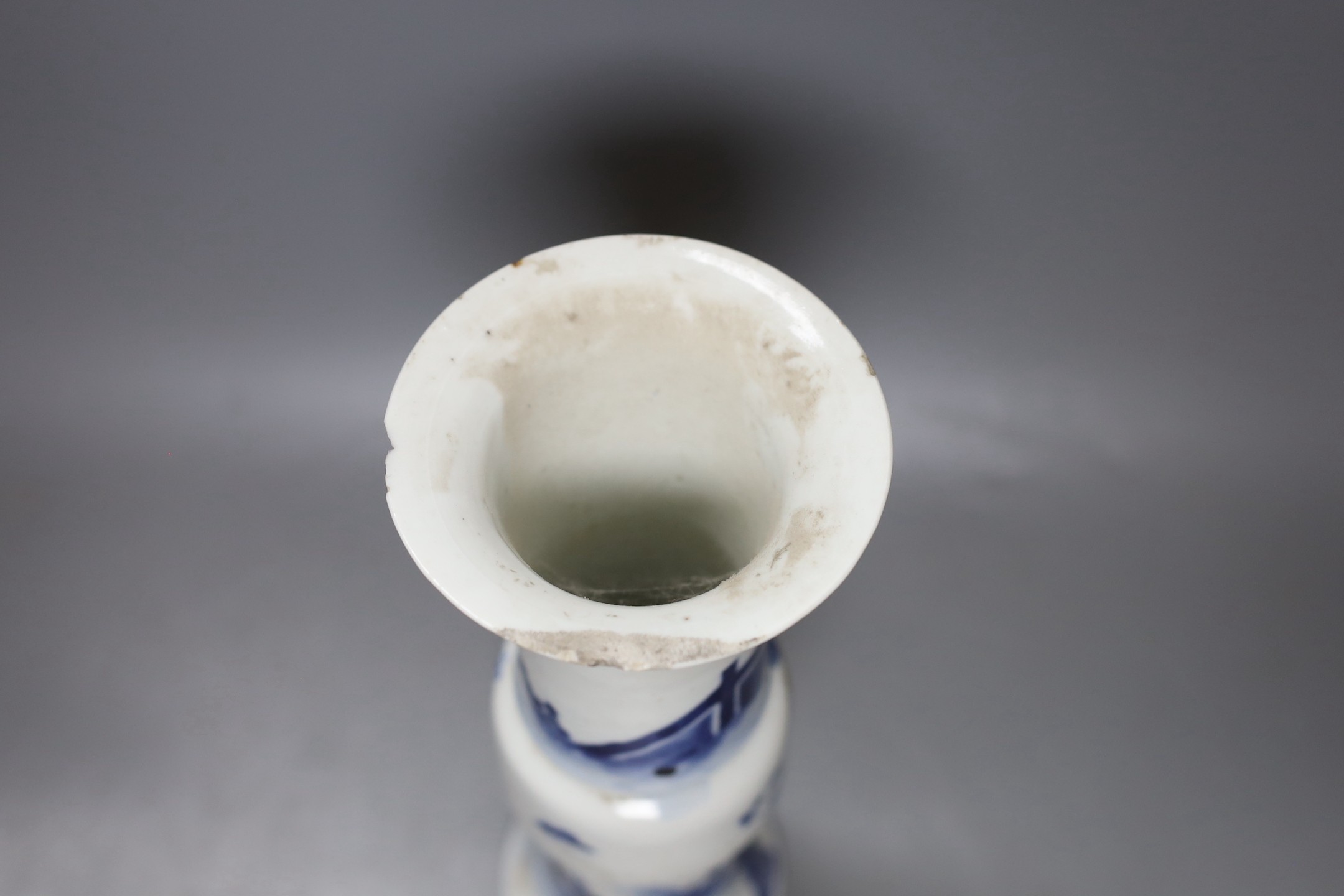 A 19th century Chinese blue and white beaker vase - 27cm tall